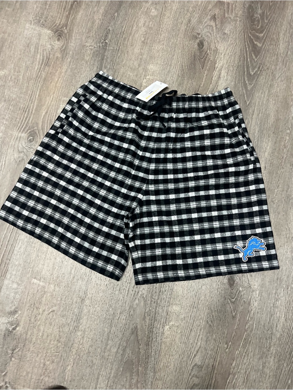 Detroit Lions Mens Men's Black & White Plaid Lounge Shorts with Blue Logo